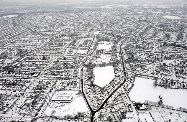 Whiteout: South London was covered by a blanket of snow on December 19 and forecasters are now warning that this winter's 'mini ice age' could last until mid-March