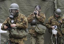 Japanese soldiers suit up to help fight the Fukushima meltdown