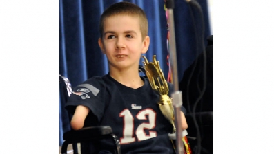 April 4: Nicholas Maxim is photographed at Readfield Elementary School in Readfield, Maine. The student at Readfield Elementary School is known for his penmanship, even though he was born without hands or lower arms (AP). 