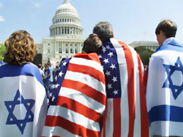 Flag-draped family at a rally at the Capitol in Washington, May 22, 2011 