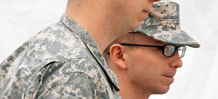 Bradley Manning, right, is escorted into a courthouse in Fort Meade. (photo: Patrick Semansky/AP)