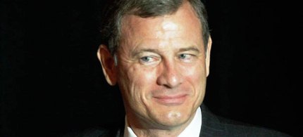 Supreme Court Chief Justice John Roberts greets President Barack Obama on Capitol Hill. (photo: AP)