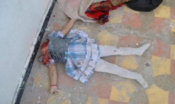 Image of child's decapitated body (image courtesy Catholic.org)