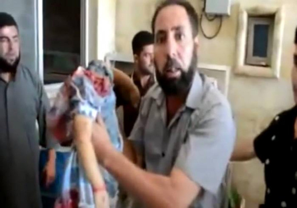 Another image of decapitated child, reportedly in Syria (image courtesy Catholic.org)