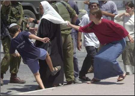 Palestinian woman being attacked by Jewish settlers