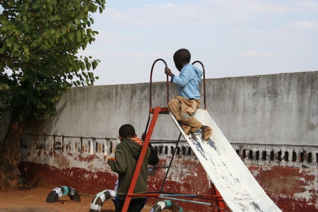 Afraid of losing playmates, children hide their HIV positive status from their peers. Credit: Busani Bafana/IPS