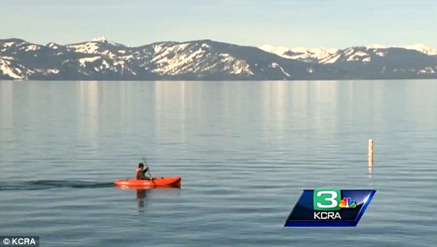 Invaders: The lake, pictured, already is under attack by the bigmouth bass which Christine Ngai, a researcher who frequents the lake, is trying to clear out