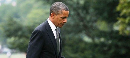 President Obama returning to the Oval Office, 07/20/12. (photo: Getty Images)